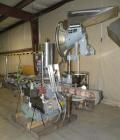 Used Consolidated TG-6-15 Rotary Chuck Capper. Capable of speeds up to 75-150 cpm. Currently set up for 24mm caps. Includes (1) Consolidated vertical sorter, model F30, driven by a 3/4 hp, 3/60/208-2...