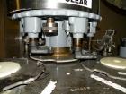 Used Consolidated TG-6-15 Rotary Chuck Capper. Capable of speeds up to 75-150 cpm. Currently set up for 24mm caps. Includes (1) Consolidated vertical sorter, model F30, driven by a 3/4 hp, 3/60/208-2...
