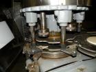 Used Consolidated TG-6-15 Rotary Chuck Capper. Capable of speeds up to 75-150 cpm. Currently set up for 24mm caps. Includes (1) Consolidated vertical sorter, model F30, driven by a 3/4 hp, 3/60/208-2...