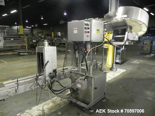 Used Anderson Machine Systems Model C1101 Single Head Chuck Capper. Machine is rated at up to 60 bottles per minute.  Machine has integrated cap sorter with cap chute.  Has air rinsing station.  Stai...