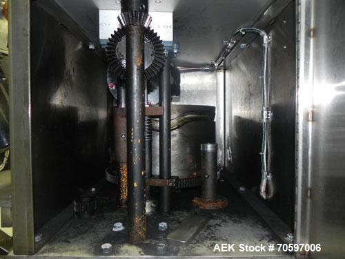 Used Anderson Machine Systems Model C1101 Single Head Chuck Capper. Machine is rated at up to 60 bottles per minute.  Machine has integrated cap sorter with cap chute.  Has air rinsing station.  Stai...
