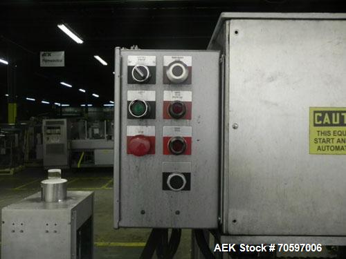 Used Anderson Machine Systems Model C1101 Single Head Chuck Capper. Machine is rated at up to 60 bottles per minute.  Machine has integrated cap sorter with cap chute.  Has air rinsing station.  Stai...