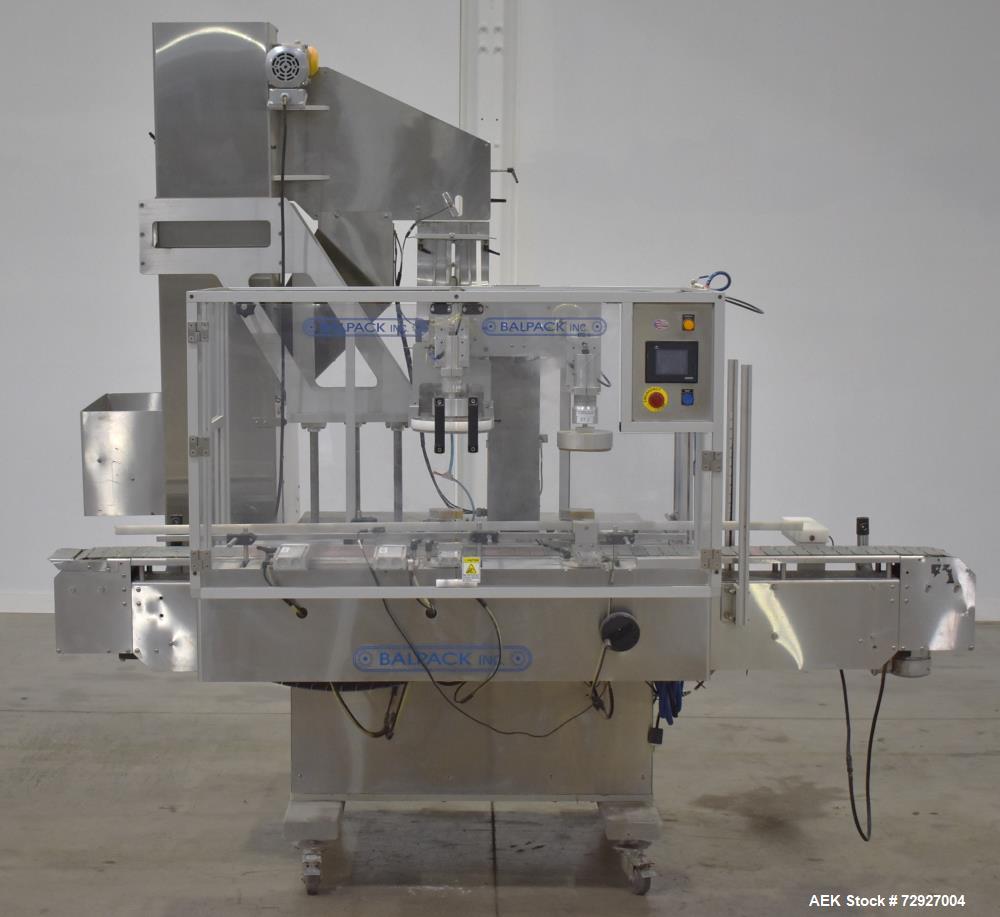 Used Balpack Automatic 2-Station Chuck Capper, Model CEIB. Fully Automatic 2 station inline chuck capper. Capable of speeds up to 55 BPM. Large format cap size range: 45mm-120mm (dia) with changepart...