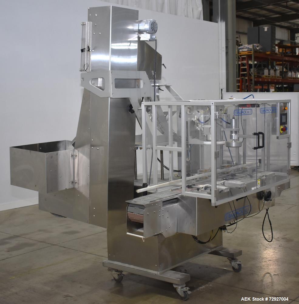 Used Balpack Automatic 2-Station Chuck Capper, Model CEIB. Fully Automatic 2 station inline chuck capper. Capable of speeds up to 55 BPM. Large format cap size range: 45mm-120mm (dia) with changepart...