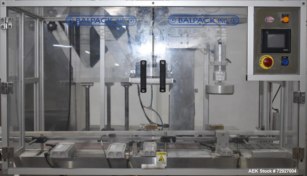 Used Balpack Automatic 2-Station Chuck Capper, Model CEIB. Fully Automatic 2 station inline chuck capper. Capable of speeds up to 55 BPM. Large format cap size range: 45mm-120mm (dia) with changepart...
