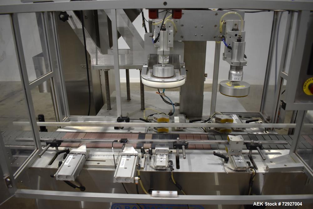 Used Balpack Automatic 2-Station Chuck Capper, Model CEIB. Fully Automatic 2 station inline chuck capper. Capable of speeds up to 55 BPM. Large format cap size range: 45mm-120mm (dia) with changepart...