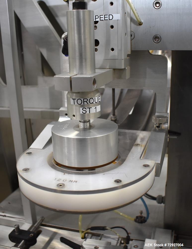 Used Balpack Automatic 2-Station Chuck Capper, Model CEIB. Fully Automatic 2 station inline chuck capper. Capable of speeds up to 55 BPM. Large format cap size range: 45mm-120mm (dia) with changepart...