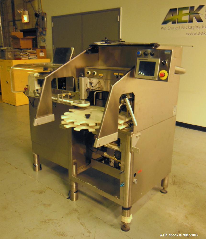 Used- Kalish (IMA) Starcap Model 5123 Single Head Chuck Capper. Machine is capable of speeds up to 90 bottles per minute. Co...