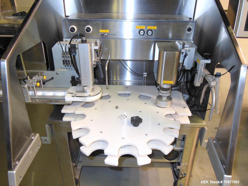 Used Kalish (IMA) Starcap Model 5123 Single Head Chuck Capper. Machine is capable of speeds up to 90 bottles per minute. Container size range: (height) 1-1/2" - 11" (diam) up to 4-1/8". Maximum cap s...