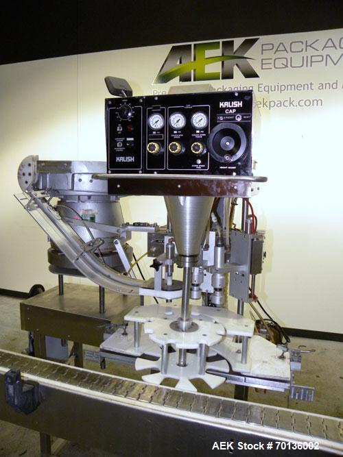Used Kalish Starcap MK V Automatic Chuck Capper. Capable of speeds up to 80 containers per minute. Model 92900, single head chuck capper Has star wheel indexing for container and was last running 16o...