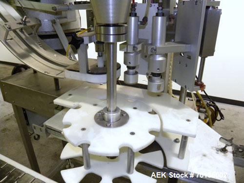 Used Kalish Starcap MK V Automatic Chuck Capper. Capable of speeds up to 80 containers per minute. Model 92900, single head chuck capper Has star wheel indexing for container and was last running 16o...