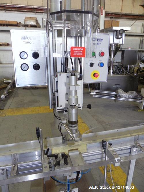 Used Kalish Inline Cap Torquer, Model Torqit 5750. Designed to tighten caps up to 90 bottles per minute by means of a slip clutch, which is adjustable to provide the desired torque. Unit is construct...