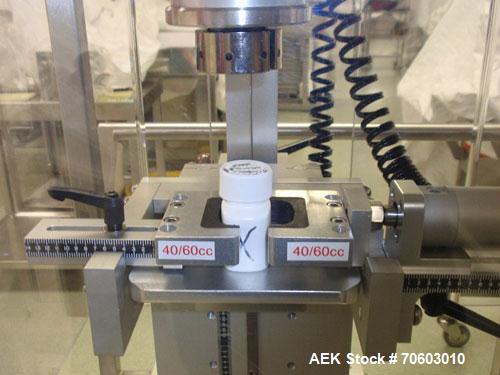 Used Sure Torque ST-120 Torque Tester. SIngle station unit. The unit can be used as a benchtop capper, tightening the cap to a defined set point. Designed to accurately measure the release torque of ...