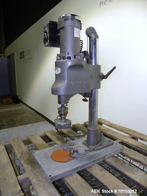 Used Swanmatic Cap Master Single Cycle Bench Top Capper, Model C300. Up to 40 caps per minute. Driven by a 1/4 hp, 90 volt, 1750 rpm DC motor with a Swan-Matic model C302E controller. Manual adjustab...