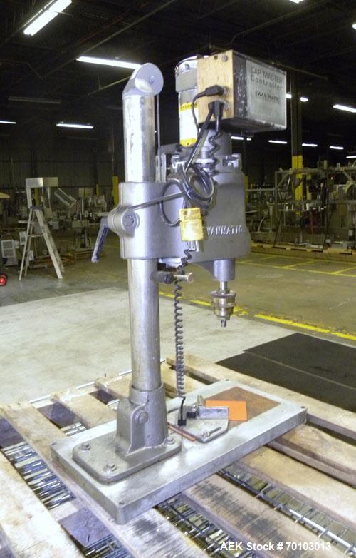 Used Swan-Matic Cap Master Single Cycle Bench Top Capper, Model C300. Up to 40 caps per minute. Driven by a 1/4 hp, 90 volt, 1750 rpm DC motor with a Swan-Matic model C302E controller. Manual adjusta...