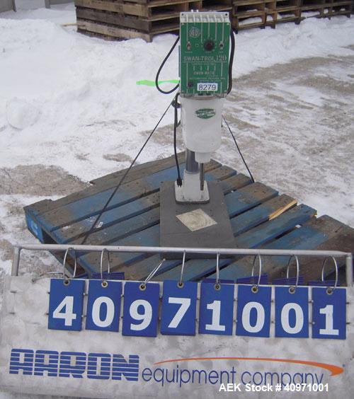 Used Swanmatic Cap Master Cap Tightener.Size range varies from 15-135 mm.Horizontally adjustable.Missing capper chuck.Driven by a 1/4 hp, 0/100 volt, 1800 rpm DC motor.Includes a Swan-Trol 120 capper...