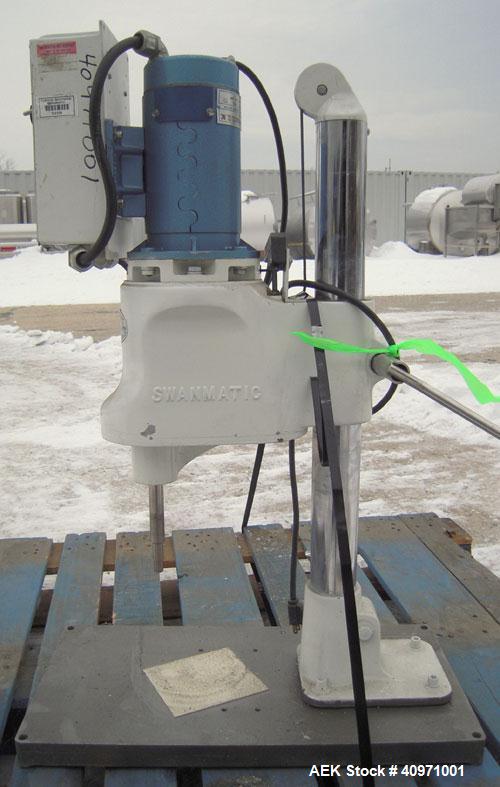 Used Swanmatic Cap Master Cap Tightener.Size range varies from 15-135 mm.Horizontally adjustable.Missing capper chuck.Driven by a 1/4 hp, 0/100 volt, 1800 rpm DC motor.Includes a Swan-Trol 120 capper...