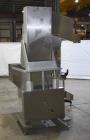 Used- Aesus Model Delta Chuckcap Automatic Single Chuck Capper. Capable of speeds up to 60 containers per minute. Has interm...