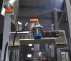 Used- Aesus Model Delta Chuckcap Automatic Single Chuck Capper. Capable of speeds up to 60 containers per minute. Has interm...