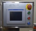 Used- Aesus Model Delta Chuckcap Automatic Single Chuck Capper. Capable of speeds up to 60 containers per minute. Has interm...