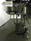 Used Anderson Machine Systems Model C1101 Single Head Chuck Capper. Machine is rated at up to 60 bottles per minute.  Machine has integrated cap sorter with cap chute.  Has air rinsing station.  Stai...