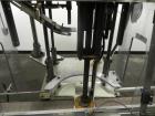 Used Anderson Machine Systems Model C1101 Single Head Chuck Capper. Machine is rated at up to 60 bottles per minute.  Machine has integrated cap sorter with cap chute.  Has air rinsing station.  Stai...