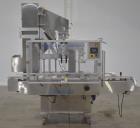 Used Balpack Automatic 2-Station Chuck Capper, Model CEIB. Fully Automatic 2 station inline chuck capper. Capable of speeds up to 55 BPM. Large format cap size range: 45mm-120mm (dia) with changepart...
