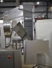 Used Balpack Automatic 2-Station Chuck Capper, Model CEIB. Fully Automatic 2 station inline chuck capper. Capable of speeds up to 55 BPM. Large format cap size range: 45mm-120mm (dia) with changepart...