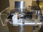 Used Kalish (IMA) Starcap Model 5123 Single Head Chuck Capper. Machine is capable of speeds up to 90 bottles per minute. Container size range: (height) 1-1/2