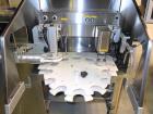 Used Kalish (IMA) Starcap Model 5123 Single Head Chuck Capper. Machine is capable of speeds up to 90 bottles per minute. Container size range: (height) 1-1/2