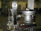 Used Kalish Starcap Automatic Chuck Capper. Capable of speeds up to 80 bottles per minute. Cap size range: 13mm to 58mm with changeparts. Currently set up on 43mm diam caps. Has a vibratory bowl feed...