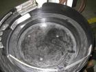 Used Kalish Starcap Automatic Chuck Capper. Capable of speeds up to 80 bottles per minute. Cap size range: 13mm to 58mm with changeparts. Currently set up on 43mm diam caps. Has a vibratory bowl feed...