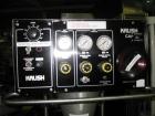Used Kalish Starcap Automatic Chuck Capper. Capable of speeds up to 80 bottles per minute. Cap size range: 13mm to 58mm with changeparts. Currently set up on 43mm diam caps. Has a vibratory bowl feed...