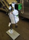 Used Swan-Matic Cap Master Single Cycle Bench Top Capper, Model 49VS. Up to 43 strokes per minute. Driven by a  1/4 hp DC motor with SCR controller. Adjustable height for up to 13’’ tall containers.