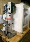 Used Swan-Matic Cap Master Single Cycle Bench Top Capper, Model C-300. Up to 40 strokes per minute. Driven by a  1/4 hp, 0-100 volt, 1800 rpm motor. Adjustable height for up to 13