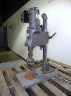 Used Swanmatic Cap Master Single Cycle Bench Top Capper, Model C300. Up to 40 caps per minute. Driven by a 1/4 hp, 90 volt, 1750 rpm DC motor with a Swan-Matic model C302E controller. Manual adjustab...