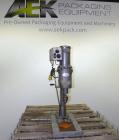 Used Swan-Matic Cap Master Single Cycle Bench Top Capper, Model C300. Up to 40 caps per minute. Driven by a 1/4 hp, 90 volt, 1750 rpm DC motor with a Swan-Matic model C302E controller. Manual adjusta...