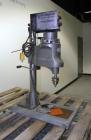 Used Swan-Matic Cap Master Single Cycle Bench Top Capper, Model C300. Up to 40 caps per minute. Driven by a 1/4 hp, 90 volt, 1750 rpm DC motor with a Swan-Matic model C302E controller. Manual adjusta...