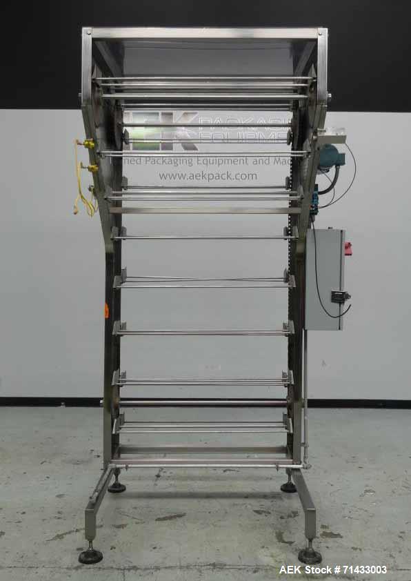 Used Del Packaging Model IVCL Incline Vertical Cap Loader.