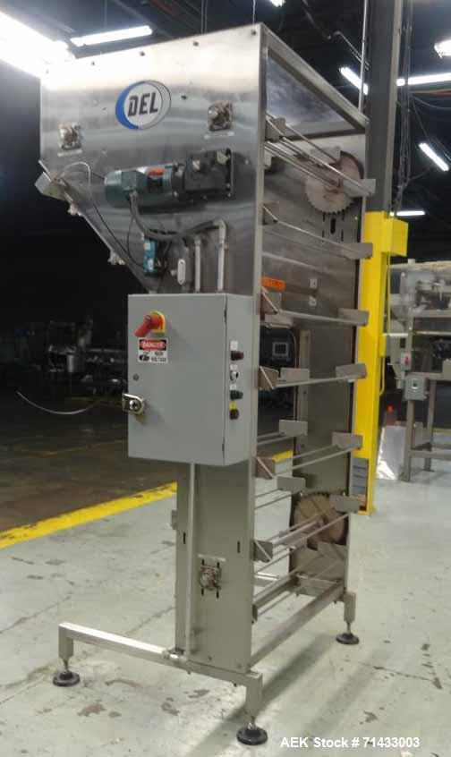 Used Del Packaging Model IVCL Incline Vertical Cap Loader.