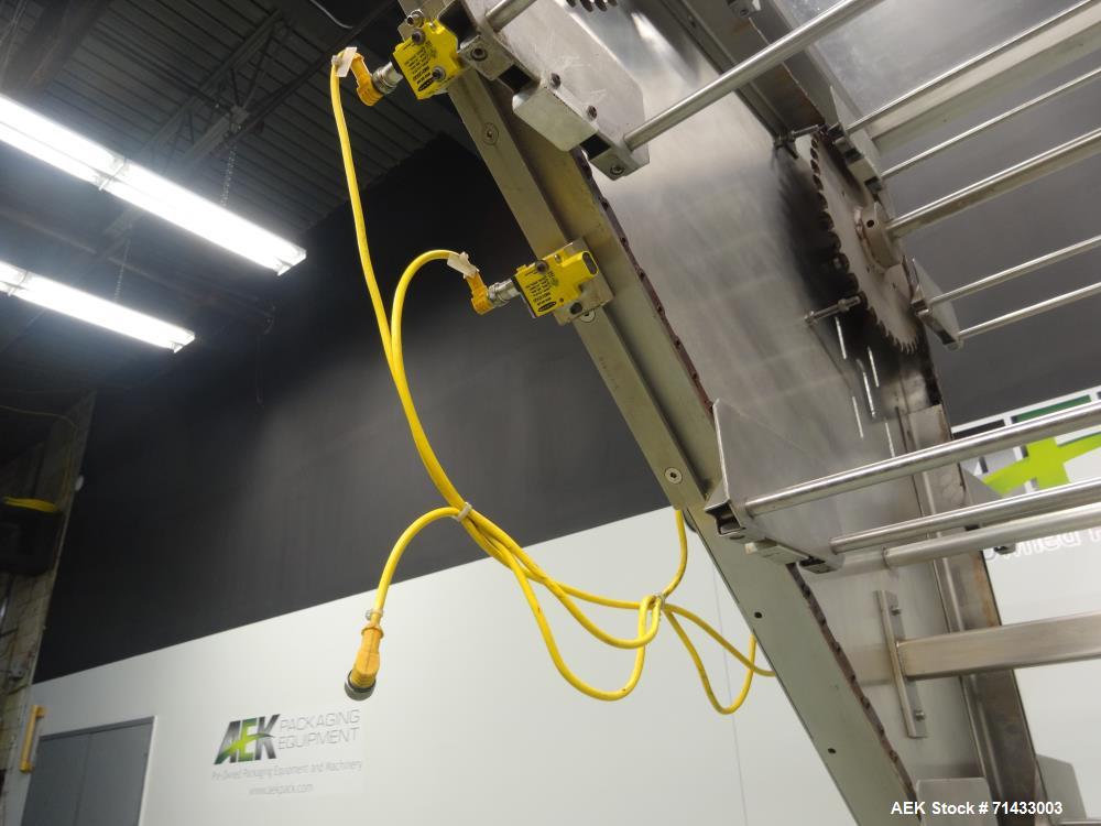 Used Del Packaging Model IVCL Incline Vertical Cap Loader.