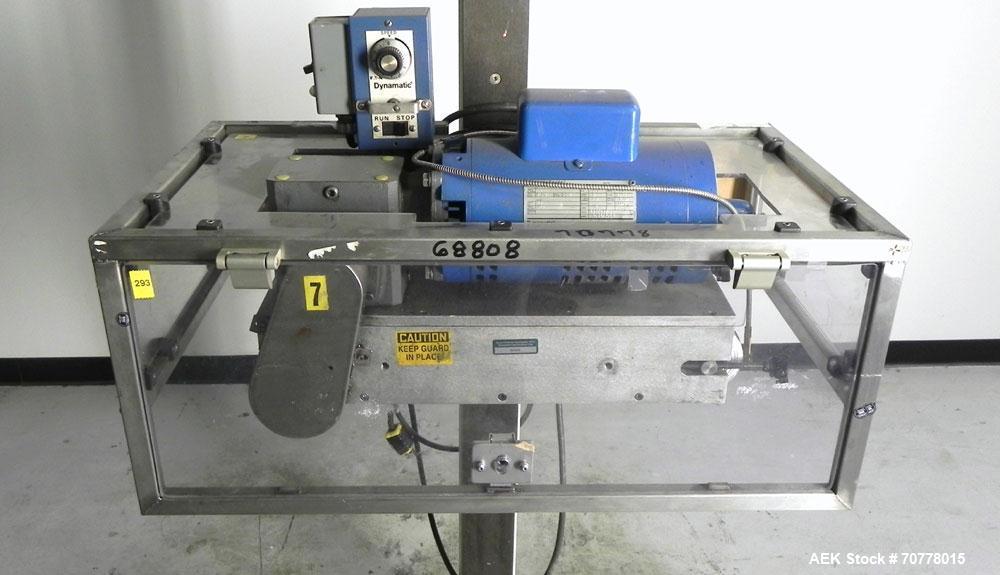 Used Eaton Dynamics overcapper belt capper.