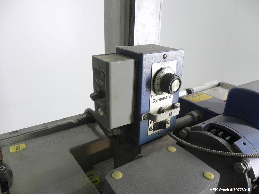Used Eaton Dynamics overcapper belt capper.