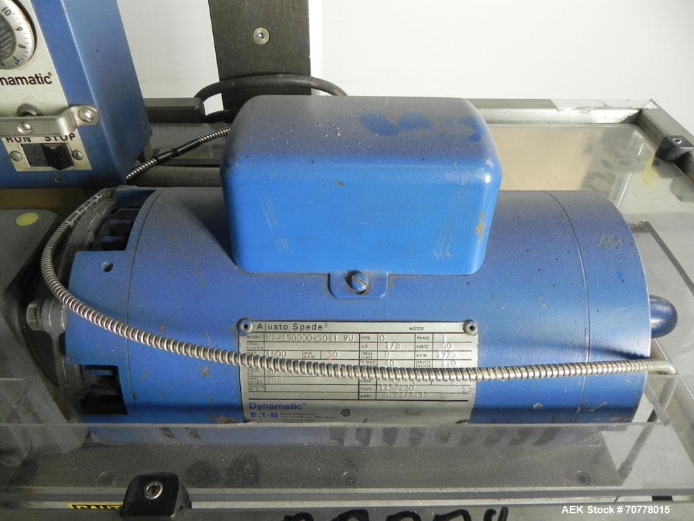 Used Eaton Dynamics overcapper belt capper.