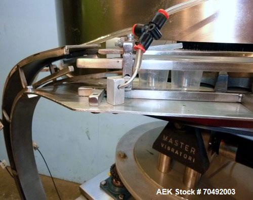 Used Healthstar 36'' Diameter Cap Sorter with Chute. Mounted on a stainless steel frame. Currently set up on approximately 1-5/8" diameter cap.