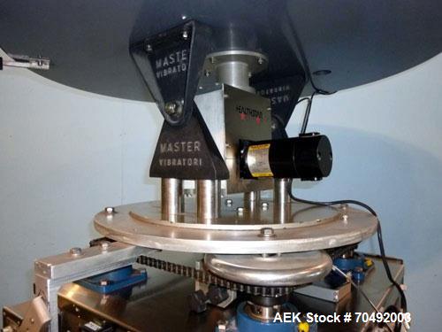 Used Healthstar 36'' Diameter Cap Sorter with Chute. Mounted on a stainless steel frame. Currently set up on approximately 1-5/8" diameter cap.
