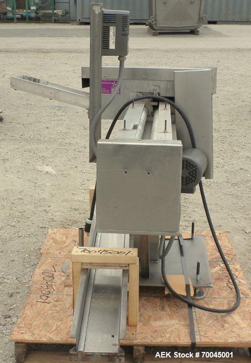 Used Holmatic Horizontal Overcapper/Lidder, stainless/aluminum construction, model PH-31. Last running 211 lids. 46" long single lane rollers, driven by a 1/4 hp, 3/60/230/460 volt, 1725 rpm motor. R...