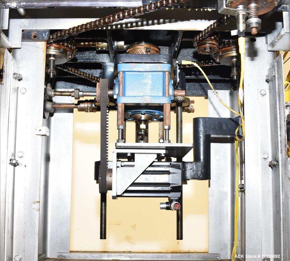 Used Change Parts Inc 8-Head Press on "Snap" Capper, Model SC-8-15.