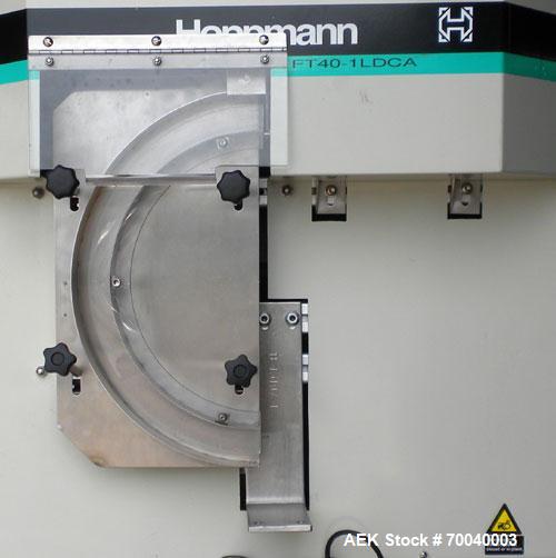 Used Universal Dose Cup Feeder and Applicator, Model E-7586. Line consists of: (1) Pharmaceutical Centrifugal Hoppman Feeder, Model FT401RLDCA, Serial number FT401RLDCA00095, built in 2002. Machine i...