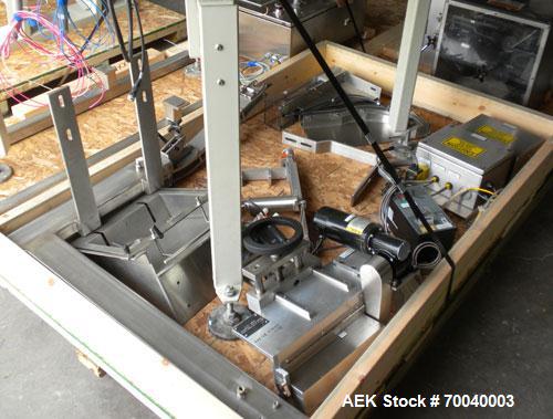 Used Universal Dose Cup Feeder and Applicator, Model E-7586. Line consists of: (1) Pharmaceutical Centrifugal Hoppman Feeder, Model FT401RLDCA, Serial number FT401RLDCA00095, built in 2002. Machine i...